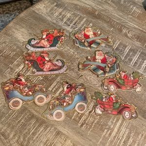 Vintage**Christmas Eve Inc**Foil Die Cut Santa's Rides Ornaments**1983